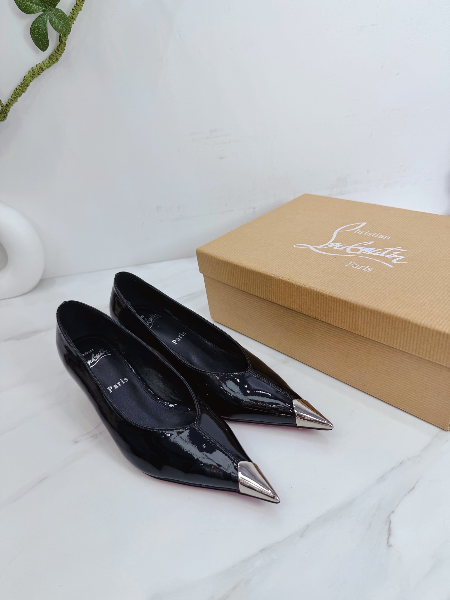 Cistian Louboutin