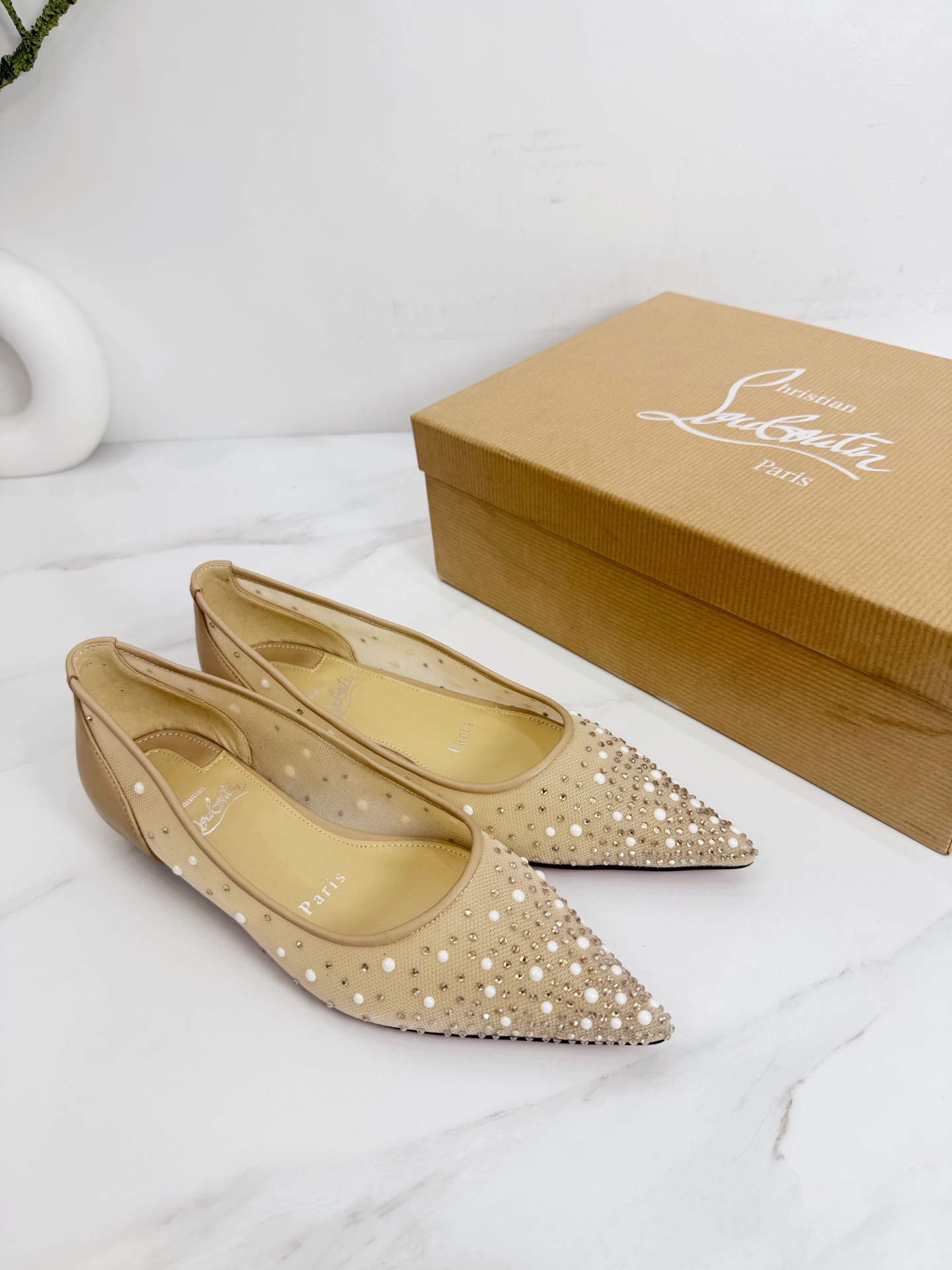 Cistian Louboutin